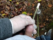 Autumn outdoor self catheter insertion, pee in forest