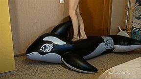 Emma stomping and deflate the big whale - 4K
