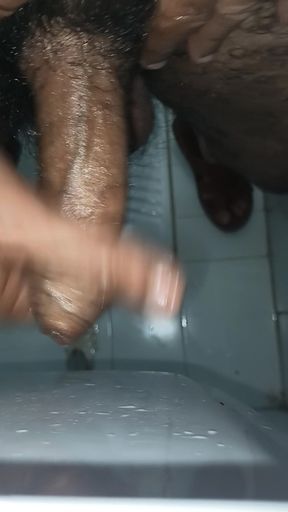 Indian middle age man massage his pennis with oil and gel