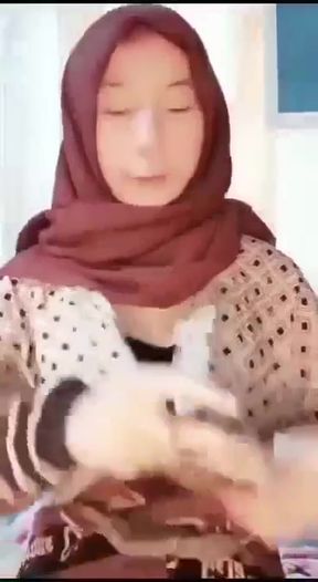 Curvy hijabi amateur shows off her natural cute tits in a homemade