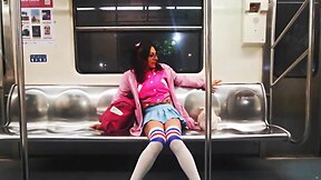 Young woman gets aroused and touches herself while riding the subway, hoping for some physical contact.