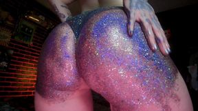 Alternative girl makes a mess with oil spanking by glitters