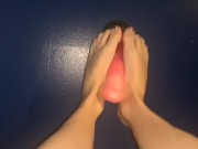 POV giving a knotty dildo a footjob