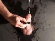 The guy made a homemade glory hole and came powerfully from a strong orgasm