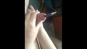 Handjob with a pen in a penis