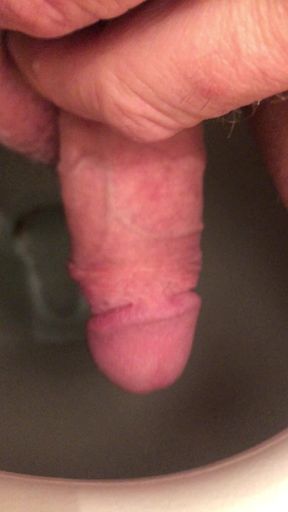 My cock peeing sitting!...