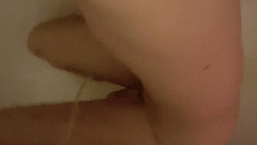 Naked amateur boy used as a urinal by his flatmate (he pees on his back, ass then body and hard cock)