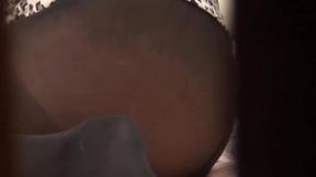 ”Japanese lady starts rubbing on her cunt while moaning”