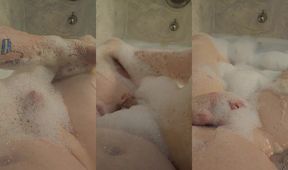 Tatted transgender cock worshipped while soapy feet drip in bubble bath