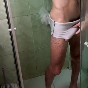 Hairy man with a big, thick dick taking a shower