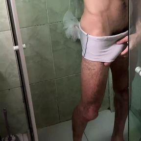 Hairy man with a big, thick dick taking a shower