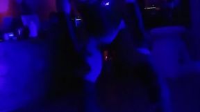 Lucy L'Vette dancing topless in a black patent leather waist cincher and boots