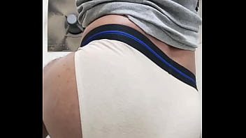 He is showing her big ass to everyone, and she enjoys doing it
