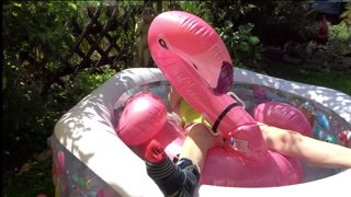 Lingerie Wet Haul  and ride an inflatable Flamingo