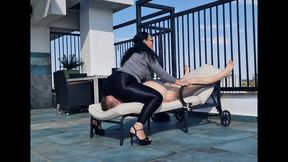 Mistress Luna and Faith - Luxury facesitting on the roof in chastity