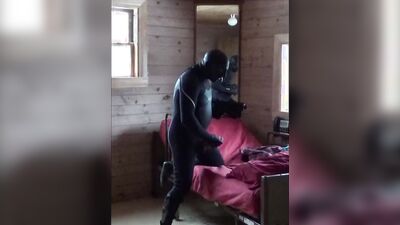 double cocked fantasy in a wetsuit