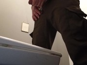 pee in a public toilette