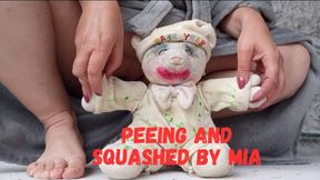Peeing and squashed by Mia