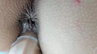 Lesbians Share Intimate Dildo Play in Bedroom