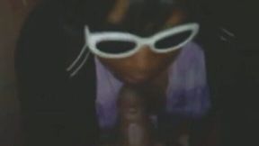 Black dumb cock gobbling whore in sunglasses its dick again