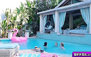 Besties hop in the pool and things heat