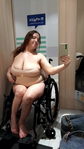 Nude woman in wheelchair