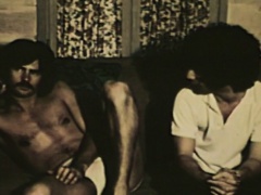 Three gay builders hook up on the couch and satisfy their sexual urges