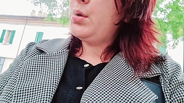 Sexy chubby readhead smoke in a garden