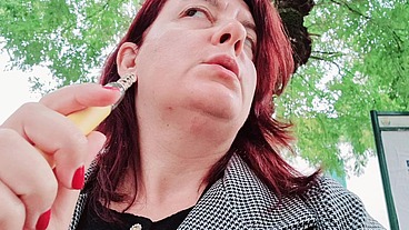Sexy chubby readhead smoke in a garden