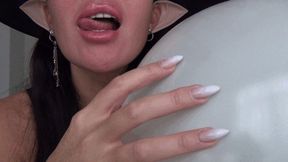 The shrill sound of a witch scratching a balloon b