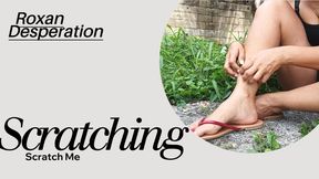 Roxan uses her nails to scratch her feet (3)