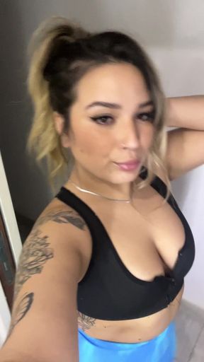 Female Onlyfans Model in Sports Bra and Tattoos