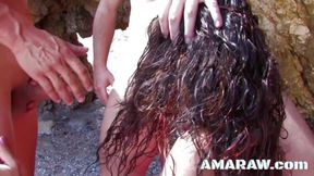 Brunette Shannaya Tweeks shared on the beach between two men