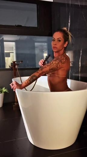 Naughty girl masturbating in the hydro