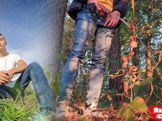 Dude lengthy pissing in the forest beneath a tree