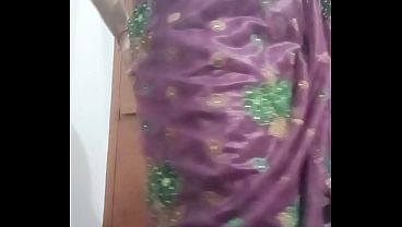 Indian Gay Crossdresser Bottom Gaurisissy showing her big boobs in purple saree
