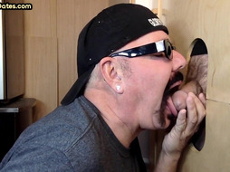 DILF mature tugging and sucking off gloryhole shaft