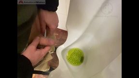 amateur redhead guy caught pissing in a public toilet s urinal - he then quickly plays with his cock before leaving