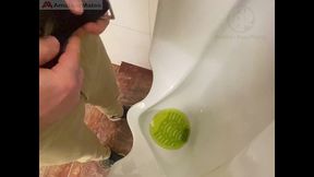 amateur redhead guy caught pissing in a public toilet s urinal - he then quickly plays with his cock before leaving