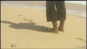 a hard cock goes into the ass of jessica fiorentino on the beach