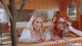 Redhead MILF and her BF share a BBC