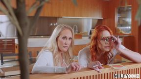 Redhead MILF and her BF share a BBC