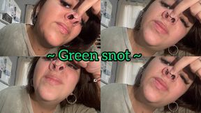Picking his nose and pulling out green snot