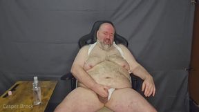 Chubby Bear oiled up and jerking off in jock strap