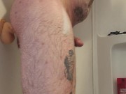 Riding a huge dildo in the shower