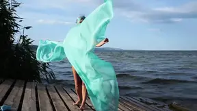 MILF in a Bikini Showcases Her Sexy Dance Moves on Windy Beach