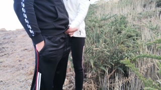 A stranger appears in the field and helps me pee