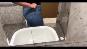 Latina beauty beats her wet pussy in the mall bathroom
