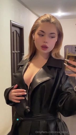 Blonde woman in leather jacket