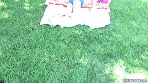 Little Bailey strips and toys with her sexy pussy outdoors